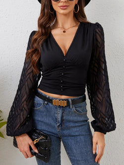 Elegante schwarze Damenbluse mit tiefem V-Ausschnitt & Laternenärmeln