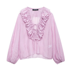 Rüschenbluse mit halbtransparentem Look